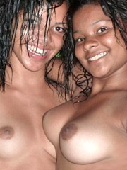 Two nasty ebony chicks in leopard g strings and with a blindfold getting their bodies covered with paints when having fun