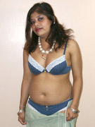 Naughty indian chick in purple sari gets naked to demonstrate her chubby delights