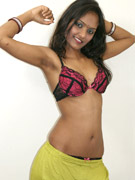 Naughty indian babe in bikini flashing her hooters