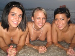 Three hot girls showing their sexy bodies on the beach