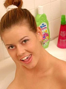 Hot ginger chick with tattoos in bikini gets naked at the poolside