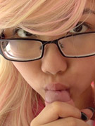 Slutty asian chick in glasses gets mouthfucked in various wigs