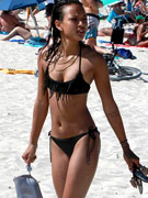Lovely karrueche trans in black bikini on white sands