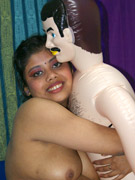 Nasty chubby indian bitch having an oral practice with a blow-up male doll