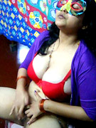Erotic indian stunner taking off her blue outfit covering her gorgeous body on the roof.