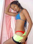 Very hot swarthy teen posing on amateur cam in bikini