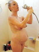 Pregnant tegan is washing in the shower