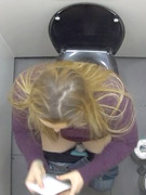 These hot chicks are getting spied on in the toilet.